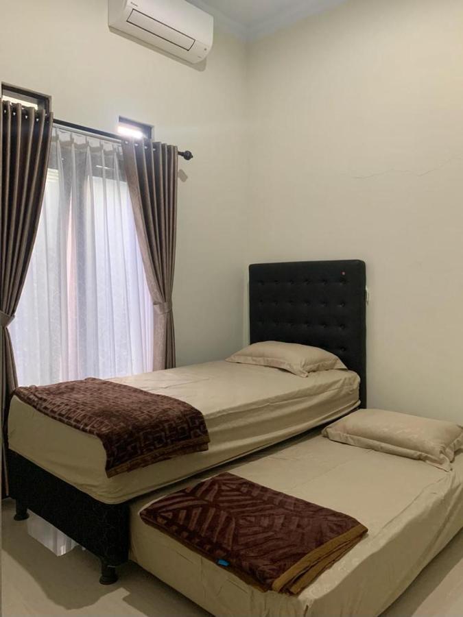 Guest House / Homestay Bukit Mutiara Residence Ngingas Экстерьер фото